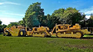 Caterpillar double D9 bulldozer DD9QuadTrac meets Cat motor scraper 1750 horsepower combination [upl. by Blakeley73]